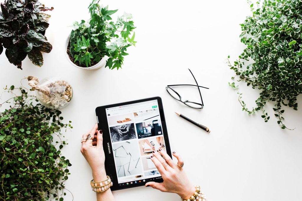 Women browsing on tablet to increase website conversions